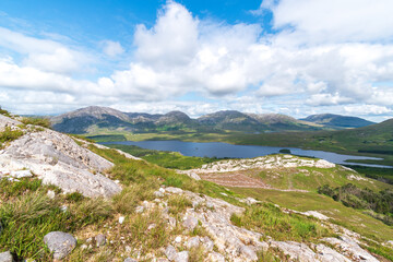 Fototapeta na wymiar Mountains view over Lough Inagh from top of Derryclare peack.