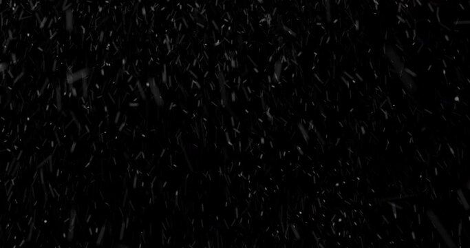 Falling white snow on a black background, realistic in 4K resolution, looped, seamless has no beginning and end. Volumetric falling snowflakes in space.