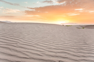 Sunrise at desert sand dunes
