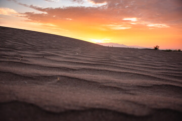 Obraz premium colorful Desert dunes at sunrise