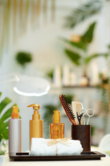 towel and hair care products in modern beauty salon