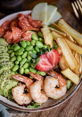 Healthy protein and omega-3 rich Shrimp, salmon and avocado salad