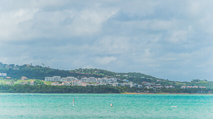 Fototapeta premium View from Luquillo beach in tropical Puerto Rico and white puffy clouds