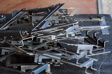 Fototapeta premium sheet metal product after processing on a bending machine.