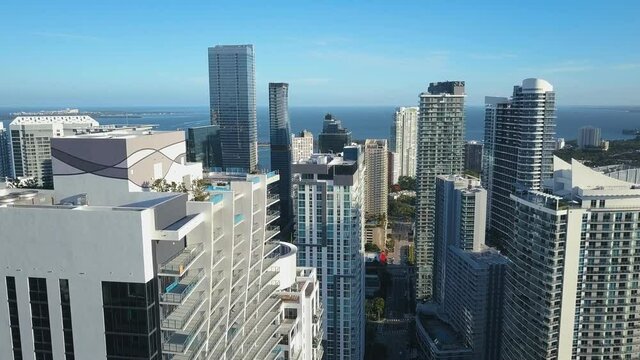 4K Aerial shot through buildings in Miami Downtown