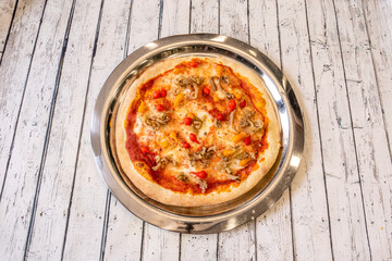 Italian Vegetable Pizza with Small Italian Peppers, Peperoni, Hot Peppers, Onions and Mushrooms