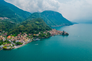 Aerial view of Varenna village. Varenna is a picturesque and traditional village on a cloudy day, located on the eastern shore of Lake Como, Italy