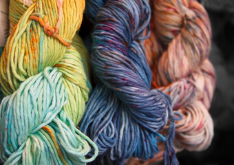 Diversified cotton yarn for knitting. Hand-dyed threads. Modern tie dye