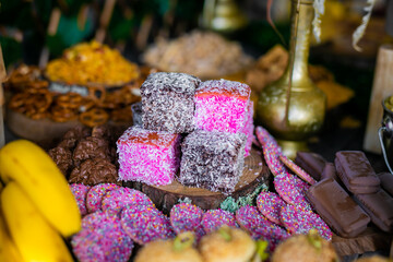 Assorted sweets and cakes served on the table, wedding reception