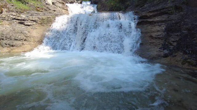 Beautiful cascading waterfall. Allison Creek Falls in Alberta, Canada near Crowsnest Pass. 