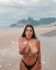 Fitness woman on a tropical beach with bikini