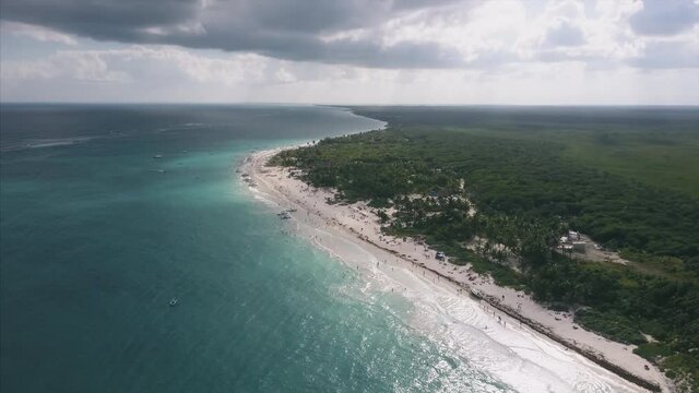 4K Epic Aerial shot of Playa Tulum Mexico Beach flying high beautiful flyover