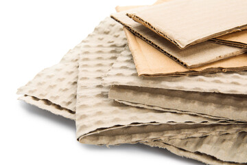 Pieces of cardboard on white background