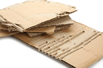 Pieces of cardboard on white background