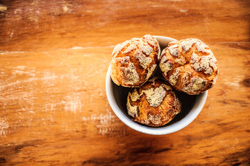  Brazilian corn breads on the table. Top view. (Broa)
