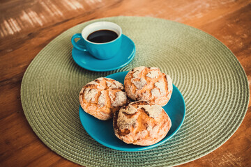 Cracker with corn flour called Broa from Brazil and a cup of coffee.
