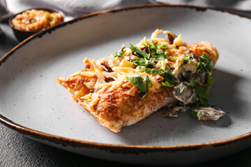 Plate with piece of delicious casserole with minced meat, closeup