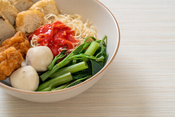egg noodles with fish balls and shrimp balls in pink sauce, Yen Ta Four or Yen Ta Fo