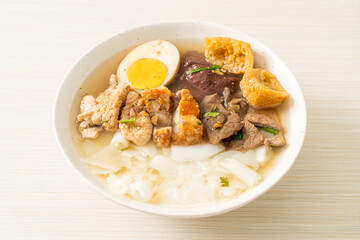 paste of rice flour or boiled Chinese pasta square in clear soup