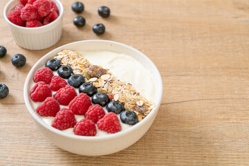homemade yogurt bowl with raspberry, blueberry and granola