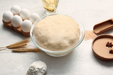 Composition with fresh dough on light background