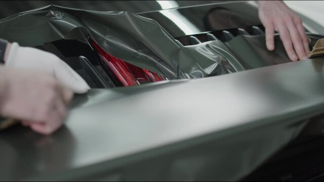 A supercar gets a vinyl wrap.