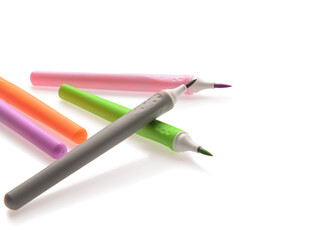 Different colorful markers on white background