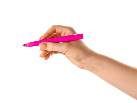 Woman holding felt tip pen on white background