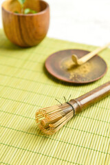 Chasen on bamboo mat, closeup