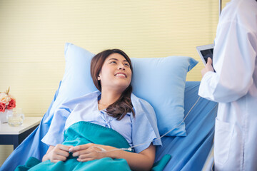 Woman doctor and patient consultation with professional specialist diagnostics at hospital medicare treatment clinic. Doctor talking to patient for medical health care therapy. Healthy medical concept