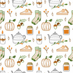 Seamless pattern with autumn elements - pumpkins, acorns, warm socks, candles, cute teapot, pumpkin pie, a jar of jam. Vector illustration in doodle style. Perfect for holiday designs, wrapping paper