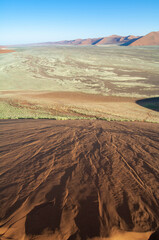 Fototapeta na wymiar The Namib desert sand dunes at Sossusviei some of the highest in the world