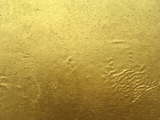 Golden color surface wall texture background 