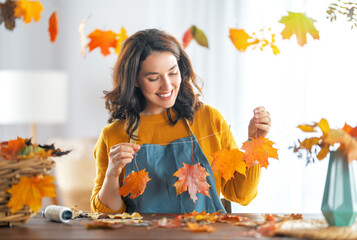 Woman doing autumn decor
