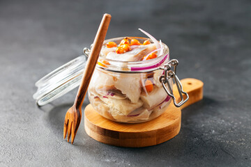 Marinated herring in jar