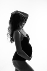Fototapeta premium silhouette of Pregnant woman on a white background