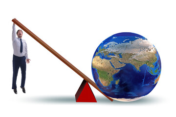 Businessman lifting the earth in challenge concept