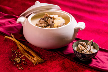 luxury braised stew shark's fin thick soup with scallop seafood and meat in big plate on wood table