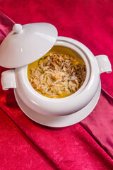 luxury braised stew shark's fin thick soup with scallop seafood and meat in big plate on wood table
