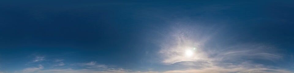 Blue sky panorama with Cirrus clouds. Seamless hdr 360 degree pano in spherical equirectangular format. Complete zenith for 3D visualization, game and sky replacement for aerial drone 360 panoramas.
