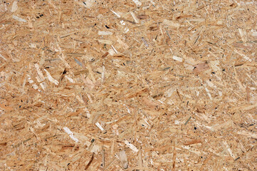 OSB (oriented strand board), rough surface of chipboard recycled wood