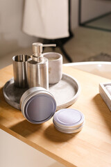 collection of various beauty hygiene products on bath background