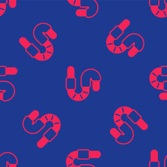 Red Worm icon isolated seamless pattern on blue background. Fishing tackle. Vector