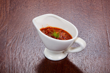 Caucasian traditional Adjika sauce in the bowl