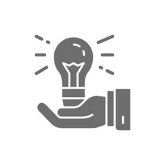 Light bulb in hand, idea generation, creative grey icon.