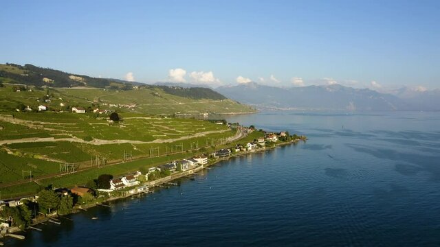 Sunset View Over Cully Village On Lake Geneva With Lavaux Vineyard In The Canton Of Vaud In Switzerland At Summer. aerial