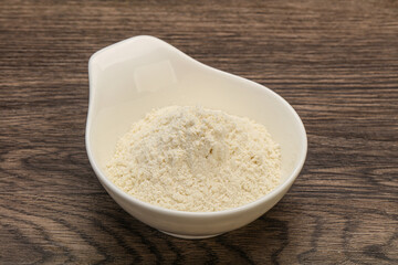 Wheat flour heap in the bowl