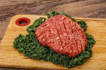 Raw beef burger cutlet for cooking