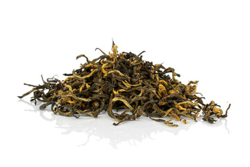 Dry black tea leaves in one group isolated on white background