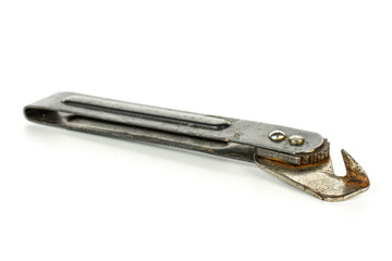 One old can opener isolated on white background